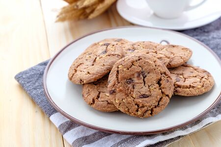 Chocolate Chip Hazelnut Cookie on wood backgroundの写真素材