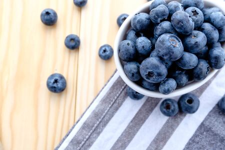 fresh blueberry on wood backgroundの写真素材
