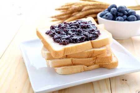 slice of bread with jam blueberryの写真素材