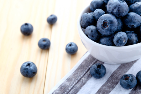 fresh blueberry on wood backgroundの写真素材