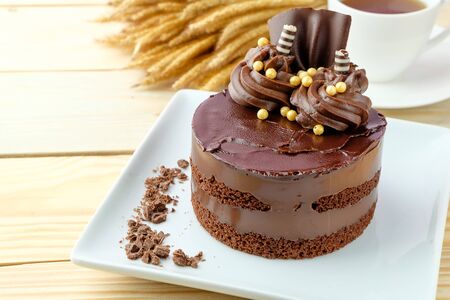 chocolate cake on wooden backgroundの写真素材
