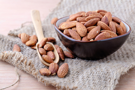 Almonds on sackcloth backgroundの写真素材