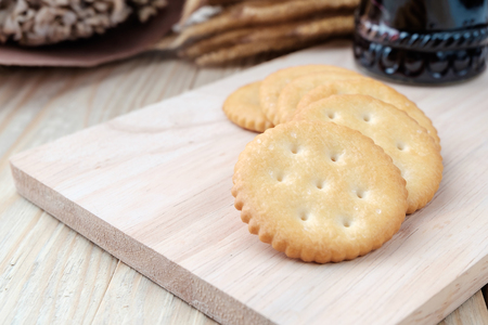 Cracker on woodden backgroundの写真素材