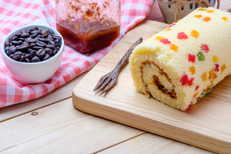 Cake Roll on wooden backgroundの写真素材