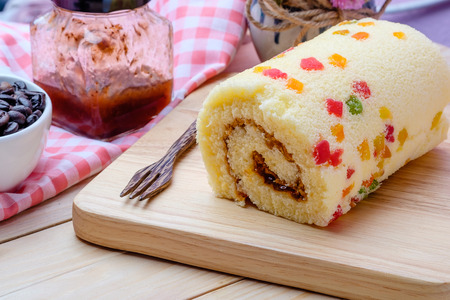Cake Roll on wooden backgroundの写真素材