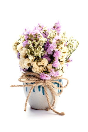 Dried flowers in a vase on white backgroundの写真素材