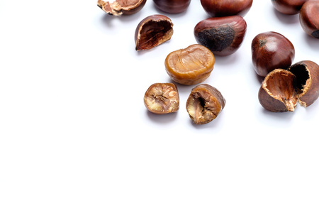 Roasted chestnuts on a white background.の写真素材