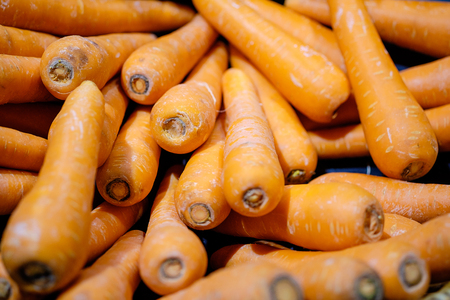 Pile of carrots in maketの写真素材