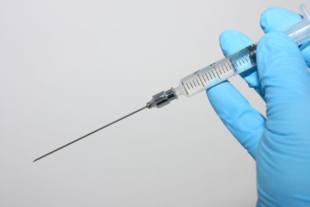 small syringe with long needle