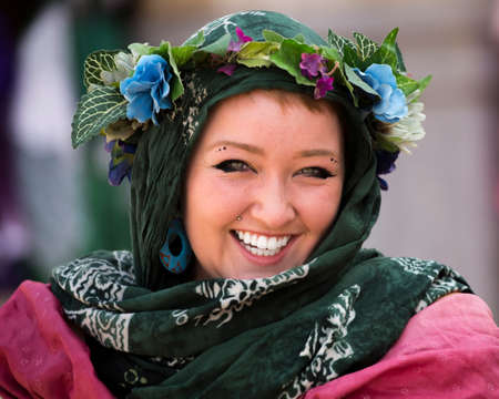 One of many women dressed in period costume at the Renaissance festival in the Phoenix area. Each played a role whether merchant, musician, particpant or visitor.のeditorial素材