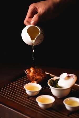 The Traditional Chinese tea ceremony is perfomed by tea master.の写真素材