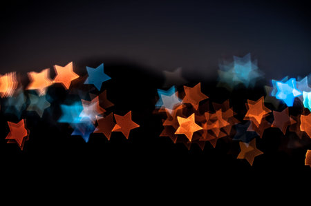 Blurred lights of Kuala Lumpur skyline, star shape bokeh
