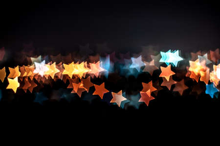 Blurred lights of Kuala Lumpur skyline, star shape bokehの写真素材