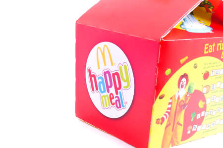 KUALA LUMPUR, MALAYSIA - APRIL 22, 2014: McDonalds Happy Meal box for kids on white background. McDonalds is the worlds biggest fast food chain.のeditorial素材