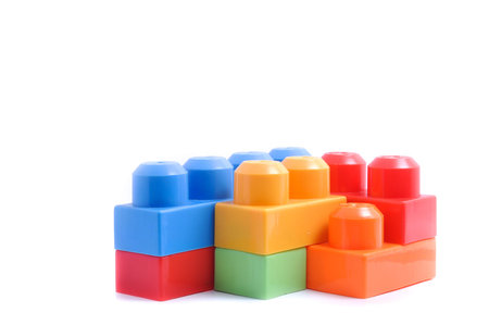 Plastic building blocks isolated on white background