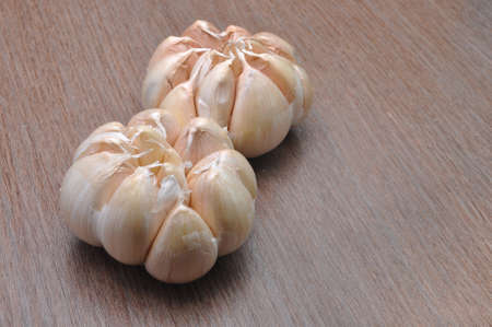 Fresh garlic on the tableの写真素材