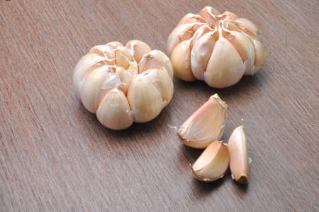 Fresh garlic on the tableの写真素材