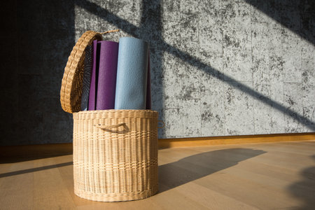 Yoga mat in the basketの写真素材
