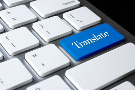 Translate on white keyboardの写真素材