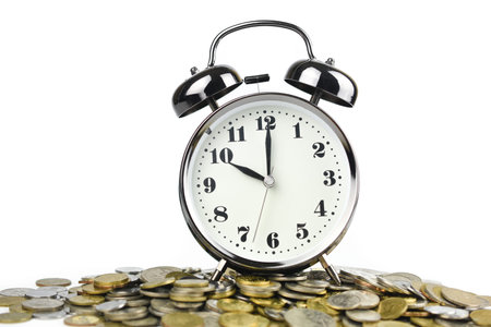 Alarm clock on the coins