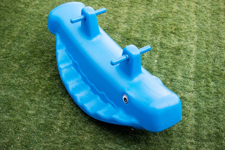 plastic seesaw on the playground