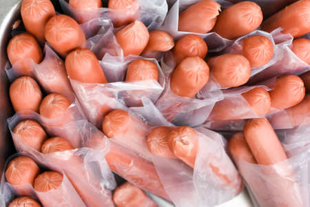 Sausages steamed in the plastic bag ready for saleの写真素材