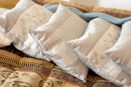 Close up detail of soft pillow on sofa in a home.