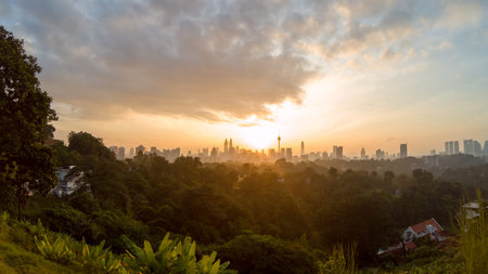 view of beautiful sunrise overlooking national landmark of Malaysiaの写真素材