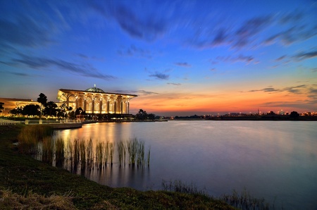 Famous Mosque with beautiful light and reflection capture at sunset and calm water  の写真素材