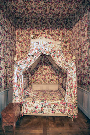 Bed of one of the rooms of the castle of Chambord in Franceのeditorial素材