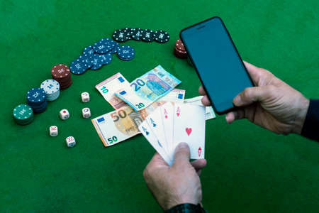 Entertainment board games that have become internet gambling games creating a great addiction and a social problem.の写真素材