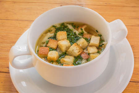 Delicious fresh soup  Hot vegetarian food on an orange wood table  Very tastyの写真素材