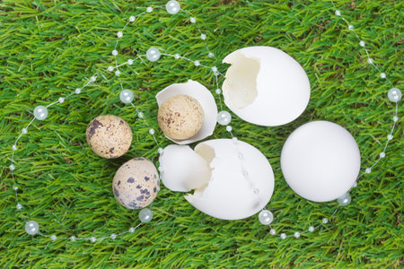 Beautiful easter nest on meadow with eggs and luxury necklace. Happy easter with hidden nest....