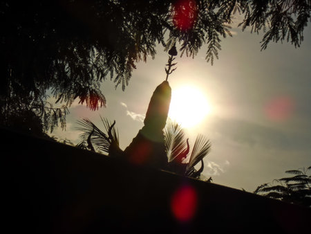 silhouette pagoda among sunlightの写真素材