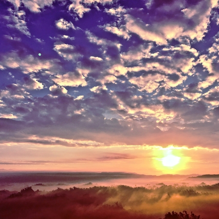 Foggy Dazzling Clouds of early mountain morningの写真素材