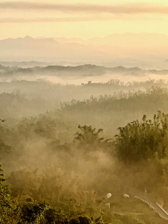 Foggy Clouds of early mountain morningの写真素材
