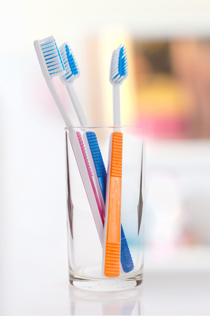 New toothbrush in glass.の写真素材