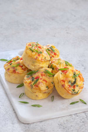 Egg muffins with ham, cheese and vegetablesの写真素材