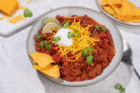 Chili con carne - traditional mexican minced meat and vegetables stew in tomato sauceの写真素材