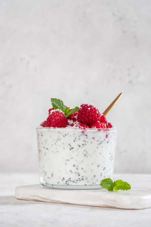 Chia pudding with coconut milk and raspberryの写真素材