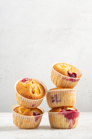 Baked Raspberry Peach Muffinsの写真素材