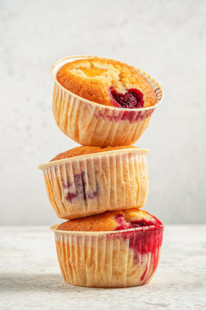 Baked Raspberry Peach Muffinsの写真素材