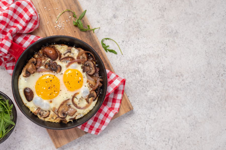 Fried egg, mushrooms and red onion.の写真素材