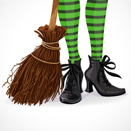 Halloween closeup witch legs in boots and with broomstick isolated on a white backgroundのイラスト素材