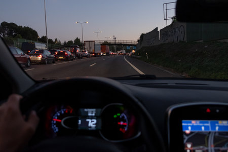 Porto, Portugal, 09.30.2022: Driving in the city of Porto, with the traffic queue at rush hour at the afternoon. Engine way POV of Driver.のeditorial素材