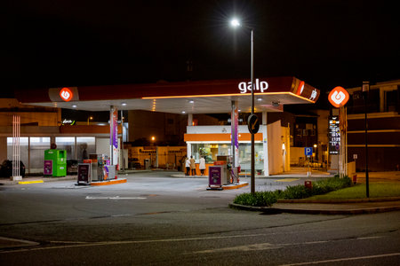 Porto, Portugal - 31.03.2023: Galp gas station at night.のeditorial素材