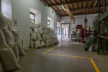 Gorreana, Azores - 29.06.2023: Gorreana Tea Factory room with stacked tea sacks.の写真素材