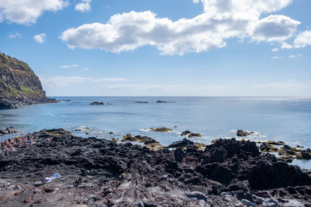 Ferraria, Azores - 04.09.2019: Bathers at Ferraria on a beautiful summer day. Thermal waters at Ponta da Ferraria, thermal waters in the sea and natural hot water pools. Sao Miguelのeditorial素材
