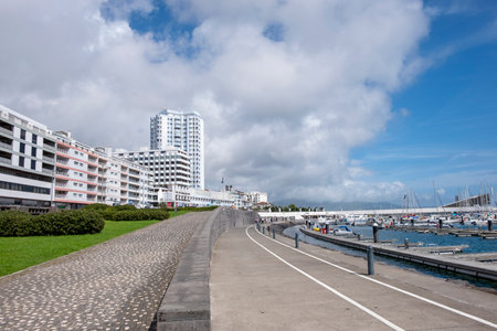 Ponta Delgada, Azores, 18.09.2019 - View of the promenade and marina in the city of Ponta Delgada with the cityscape building on the background. Sao Miguel island, Azoresのeditorial素材
