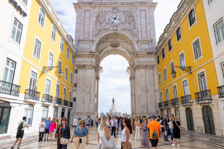 Lisbon, Portugal - 18.09.2023 The magnificent architecture in Rua Augusta Arch with the clock, viewed from Rua Augusta in Lisbon, Portugal.のeditorial素材